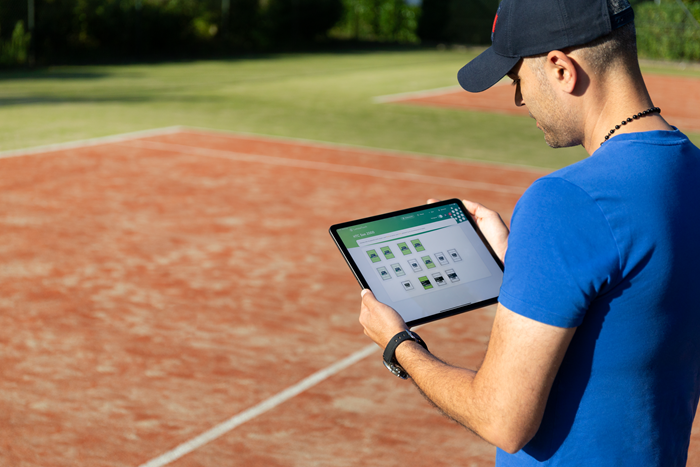 Lumosatouch LED lighting sports | operate tablet on tennis court